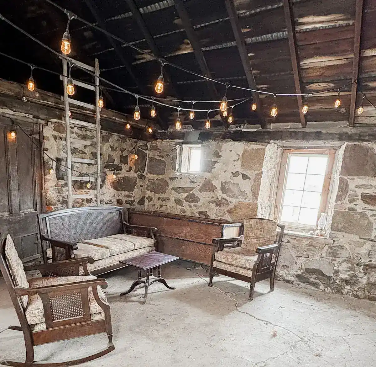 Stone fireplace in the historic smokehouse